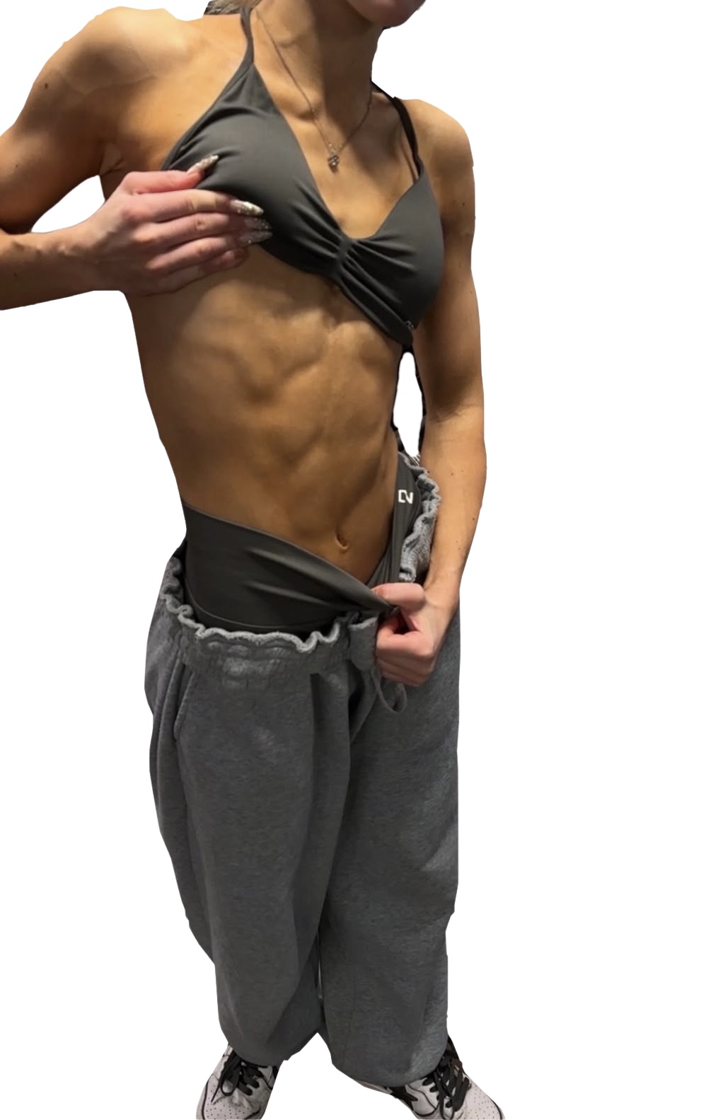 Strong, confident person showing their back muscles